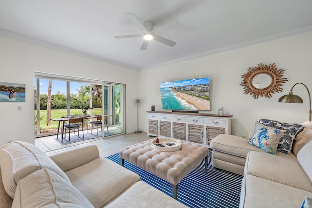 living room with ceiling fan, ornamental molding, and light tile patterned floors