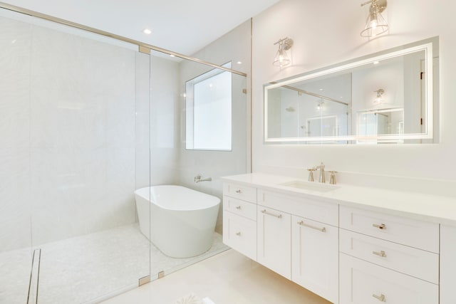 bathroom featuring vanity, independent shower and bath, and tile patterned flooring