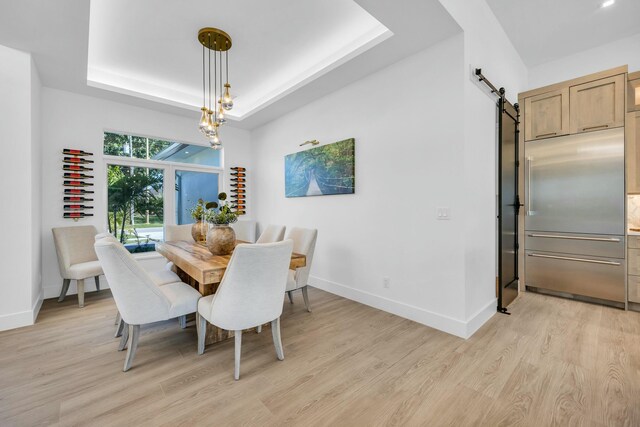 dining space featuring light hardwood / wood-style floors