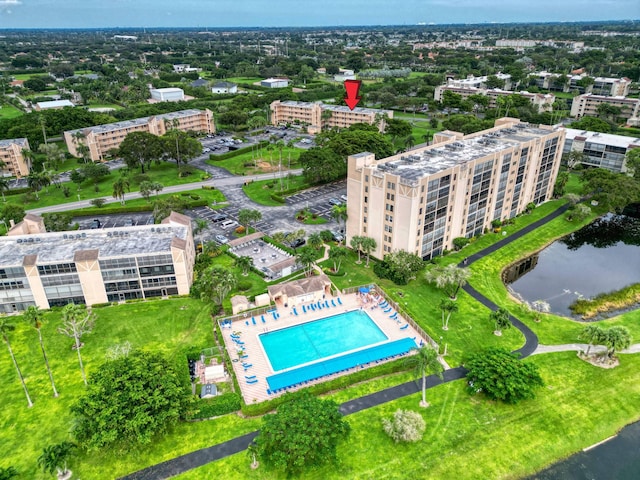 birds eye view of property with a water view