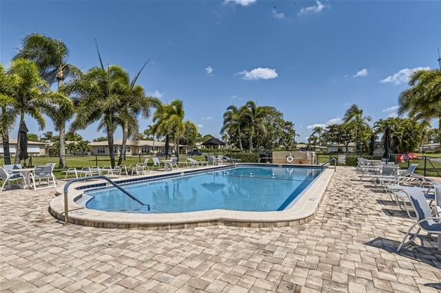 view of swimming pool with a patio area