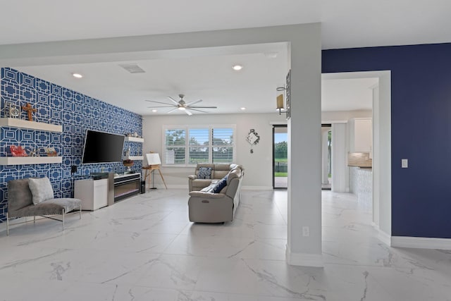 living room with ceiling fan