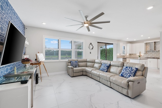 living room featuring ceiling fan