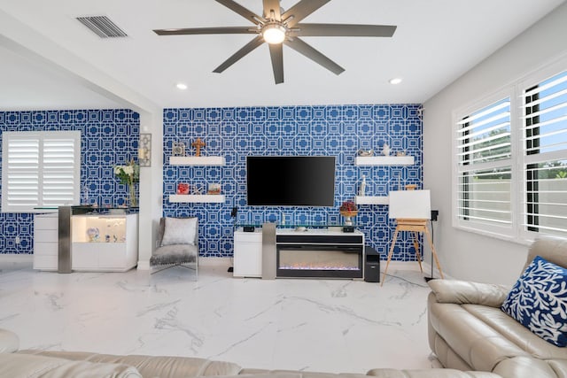 living room featuring ceiling fan