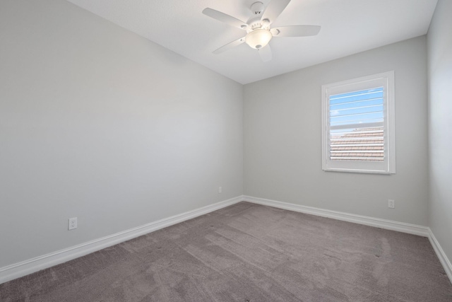 unfurnished room featuring carpet and ceiling fan