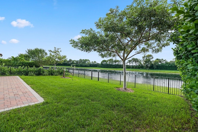 view of yard with a water view