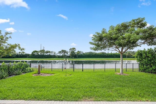 view of yard with a water view