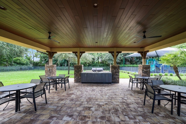 view of patio / terrace with an outdoor living space and ceiling fan