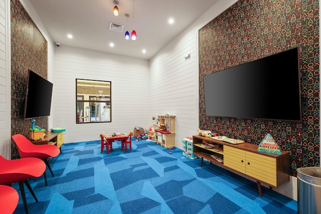 recreation room with carpet floors