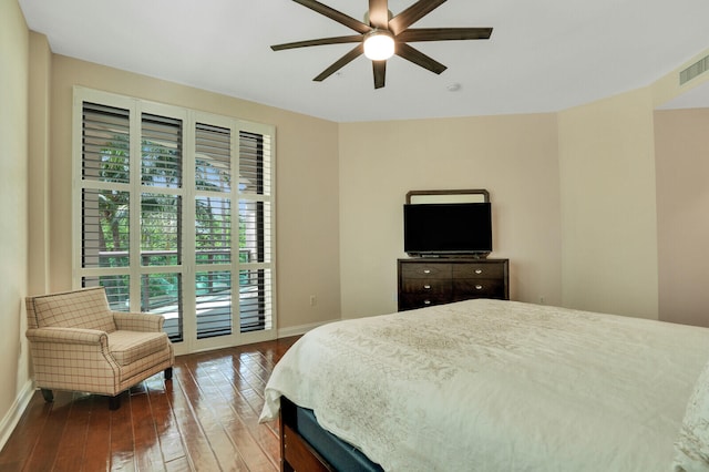 bedroom featuring hardwood / wood-style floors, ceiling fan, and access to exterior