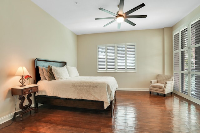 bedroom featuring dark hardwood / wood-style floors and ceiling fan