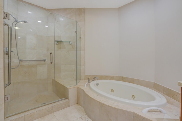 bathroom with shower with separate bathtub