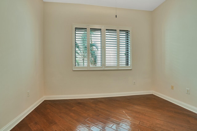 empty room featuring wood-type flooring