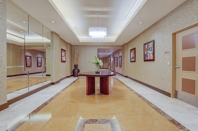 corridor with a raised ceiling