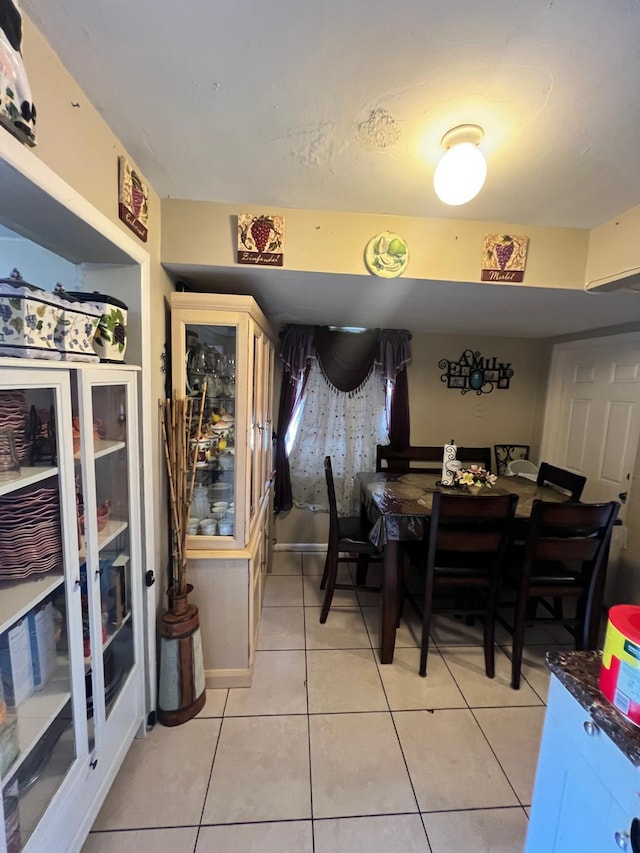 view of tiled dining space