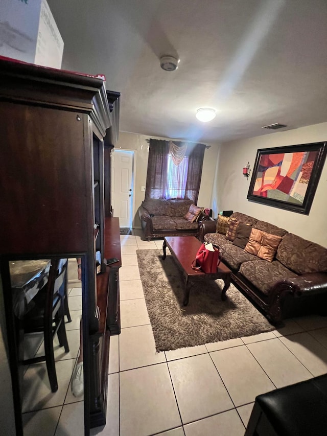 living room featuring light tile patterned floors