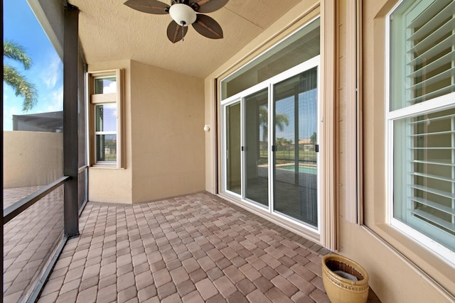 view of patio with ceiling fan