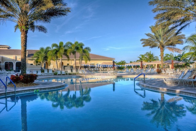 view of swimming pool featuring a patio area