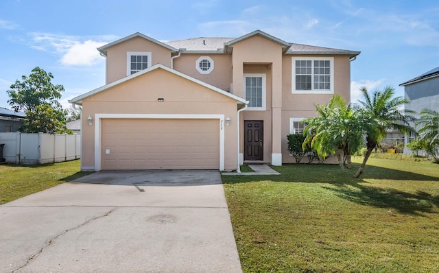 view of front property with a garage and a front lawn