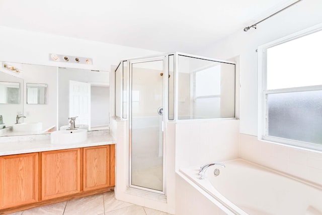 bathroom with vanity, separate shower and tub, and tile patterned floors