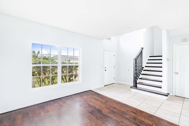 entrance foyer with light hardwood / wood-style flooring