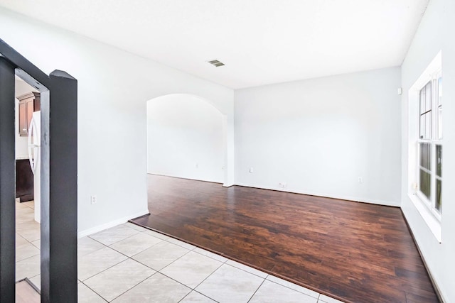 unfurnished room featuring light hardwood / wood-style flooring