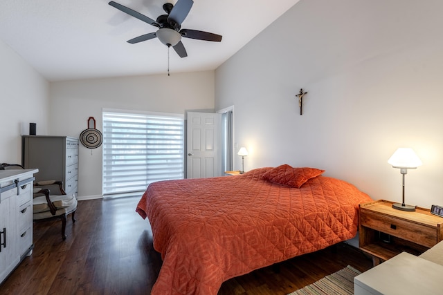 bedroom with ceiling fan, vaulted ceiling, and dark hardwood / wood-style flooring