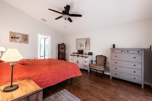 bedroom with lofted ceiling, dark wood-type flooring, and ceiling fan