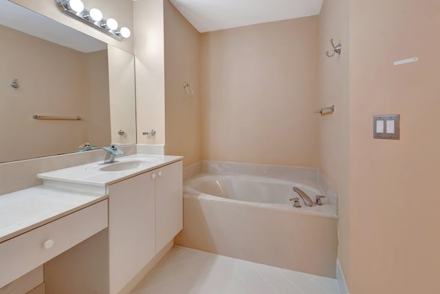 bathroom featuring vanity, a bathing tub, and tile patterned floors