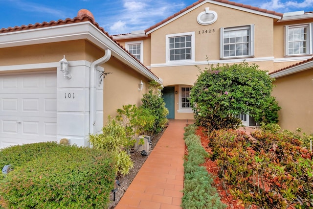 property entrance featuring a garage