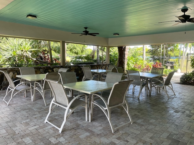 view of patio featuring ceiling fan