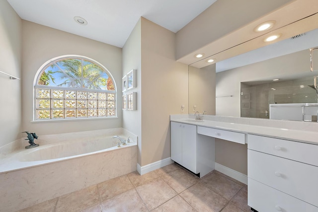 bathroom with tile patterned floors, vanity, and plus walk in shower