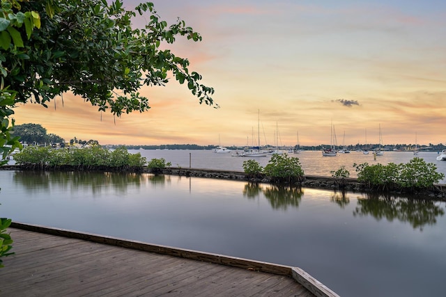 view of dock with a water view