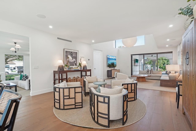 living room with light hardwood / wood-style floors