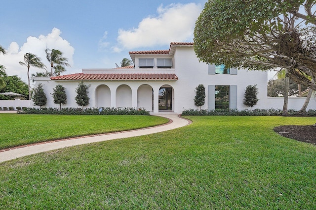 view of front of home with a front yard