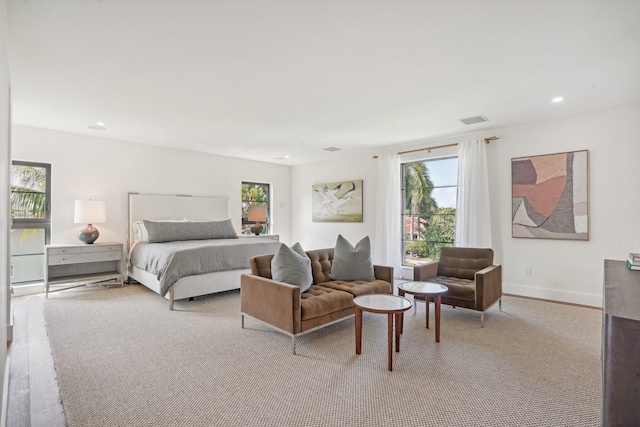 bedroom with light hardwood / wood-style floors