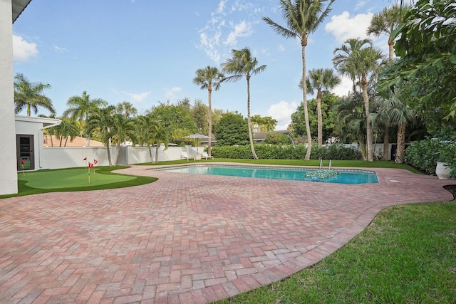 view of swimming pool featuring a patio