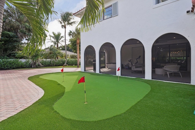 view of property's community with a patio