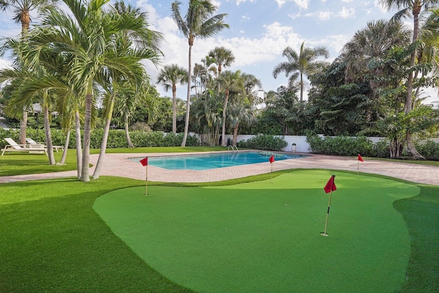 view of home's community featuring a swimming pool