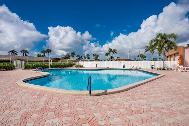 view of pool featuring a patio area