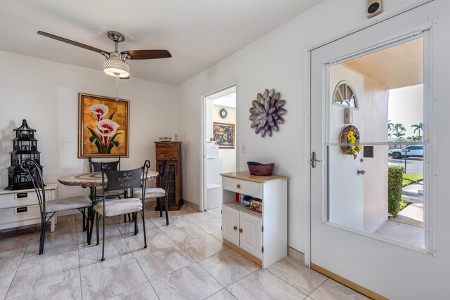 living room featuring ceiling fan