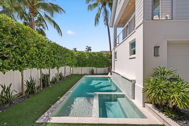 view of swimming pool with a lawn