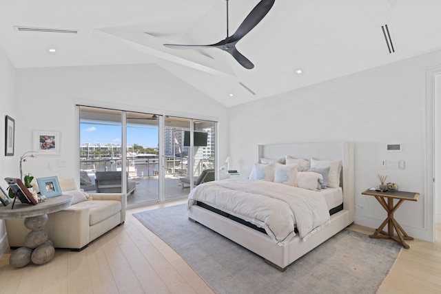 bedroom featuring light hardwood / wood-style flooring, access to exterior, high vaulted ceiling, and ceiling fan