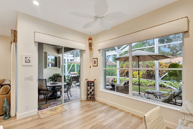 interior space featuring ceiling fan and light hardwood / wood-style flooring