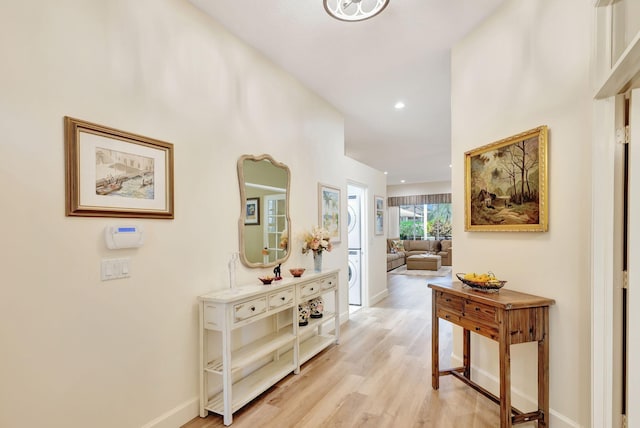 hallway featuring light hardwood / wood-style flooring