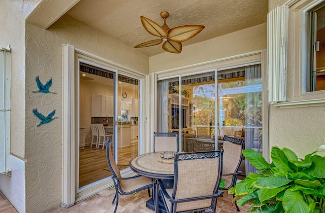 view of patio with ceiling fan