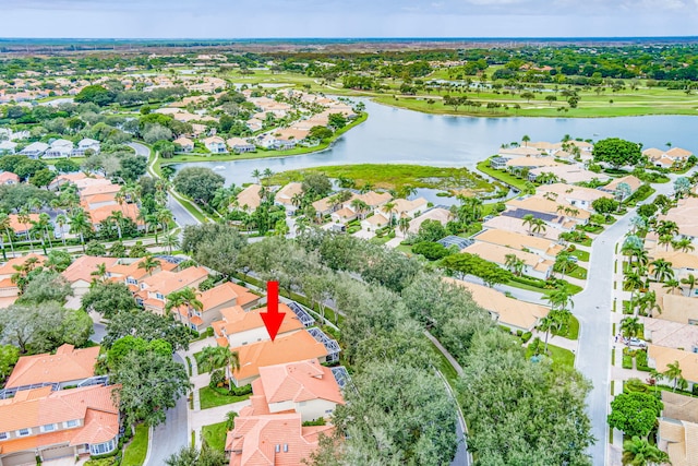 bird's eye view with a water view