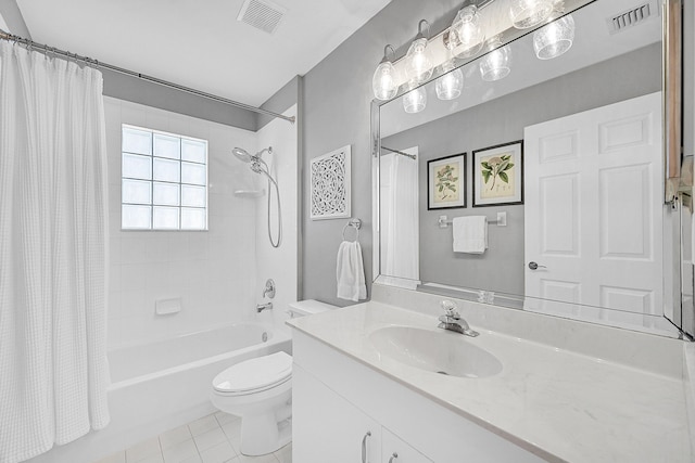 full bathroom with vanity, toilet, tile patterned floors, and shower / tub combo with curtain