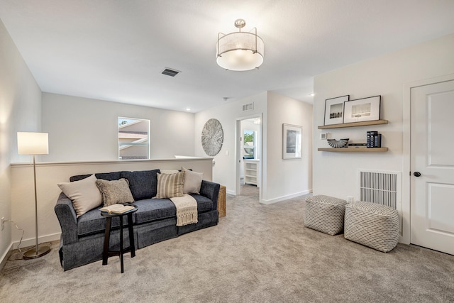 living room with a wealth of natural light and carpet