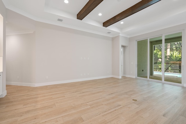 spare room featuring light hardwood / wood-style floors, ornamental molding, and beamed ceiling